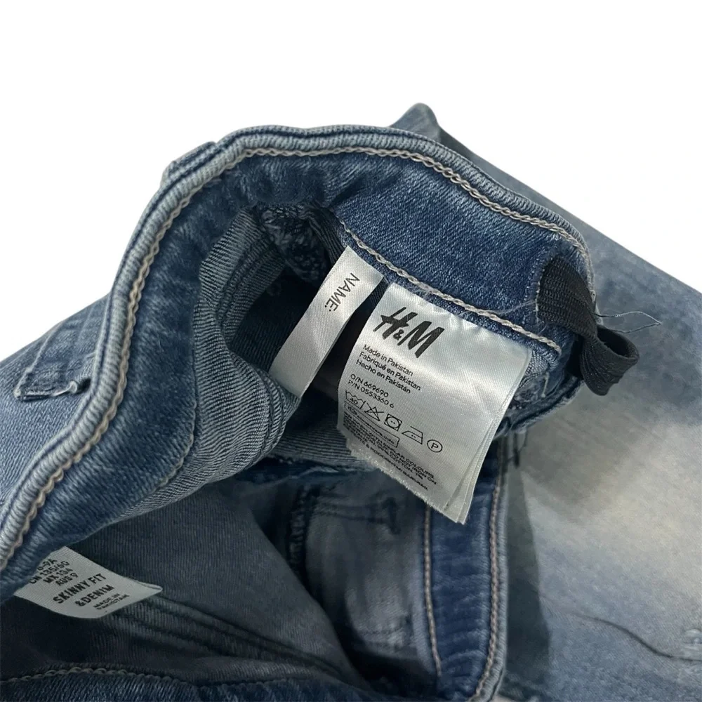 H&M Kids Blue Distressed Jeans with Pink Sequin Patches.